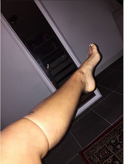 Woman Puts Condom On Her Leg To Show No Man Is Too Big To Wear One (2 pics)