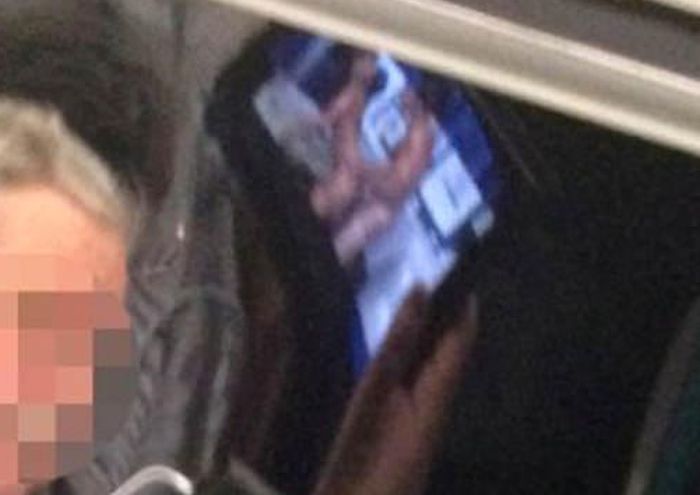 No One Noticed What This Guy Was Watching On The Train (2 pics)