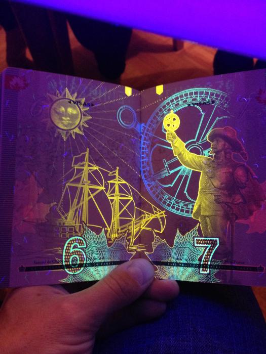 What The New Canadian Passport Looks Like Under A Black Light (18 pics)