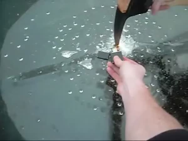 Playing With Methane Gas Bubbles On A Frozen Lake