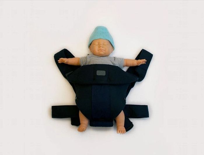 This Fake Baby Will Help You Get Away With Drinking In Public (4 pics)