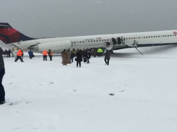Plane Skids Off Snowy Runway At New York's LaGuardia Airport