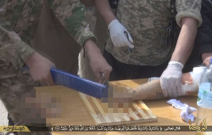 ISIS Amputates Hand Of A Motorbike Thief (8 pics)