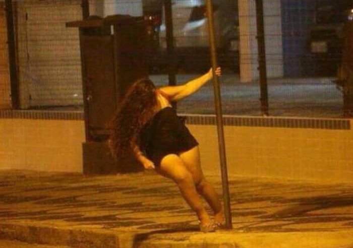 When Pole Dancing In The Street Ends Badly (2 pics)