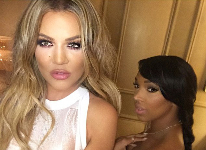 Khloe Kardashian Shows Off Her Body In A Tight White Dress (16 pics)
