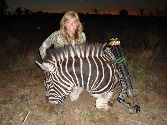 A Hunter Is Getting Death Threats After Taking A Photo A Dead Giraffe (14 pics)