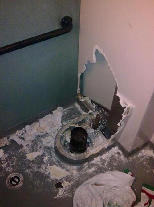 His Arm Got Stuck In A Toilet After He Dropped His Phone (4 pics)