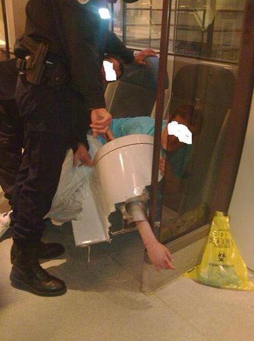 His Arm Got Stuck In A Toilet After He Dropped His Phone (4 pics)