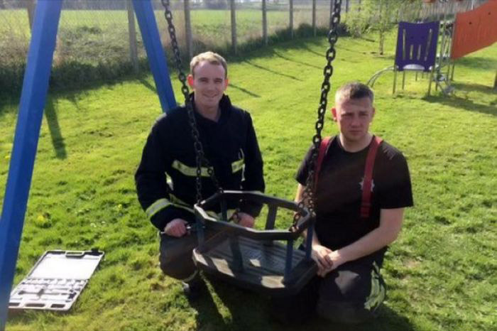 Firefighters Had To Rescue This Teenager Stuck In A Child's Swing (3 pics)