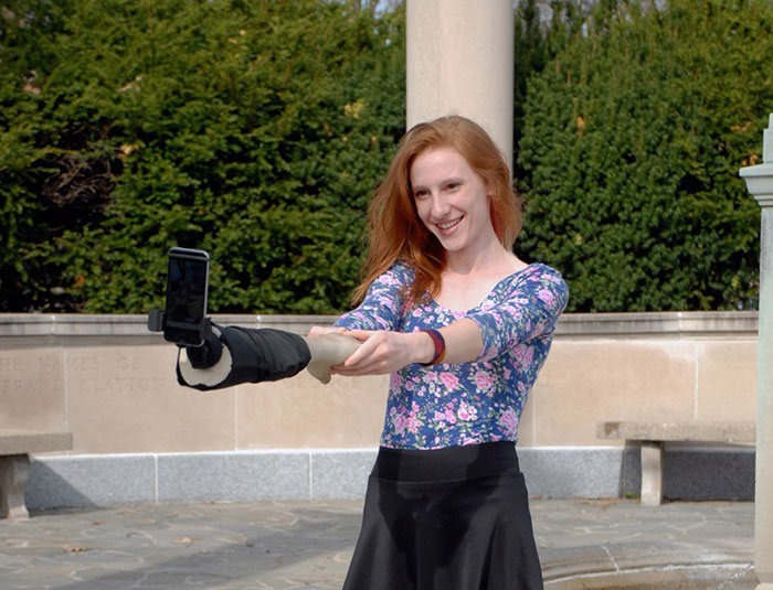 This Selfie Stick Looks Like An Arm So People Will Think You Have Friends (5 pics)
