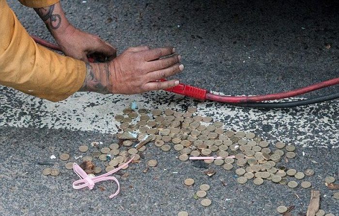 Millions Of Coins Spill On To The Streets Of England (16 pics)