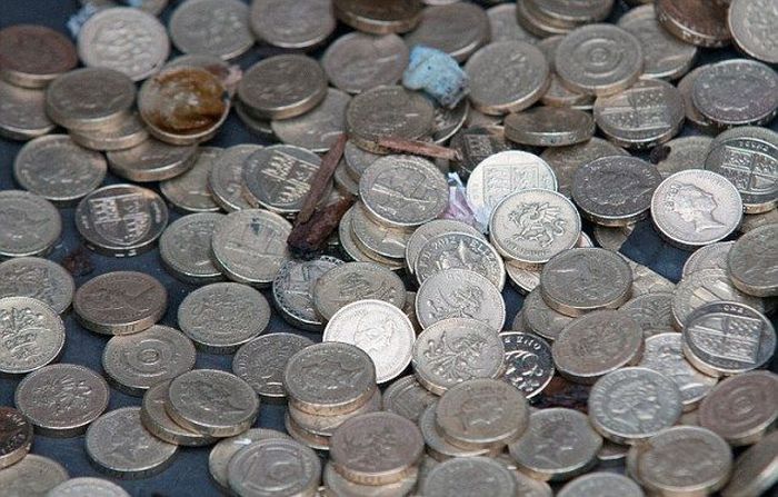 Millions Of Coins Spill On To The Streets Of England (16 pics)