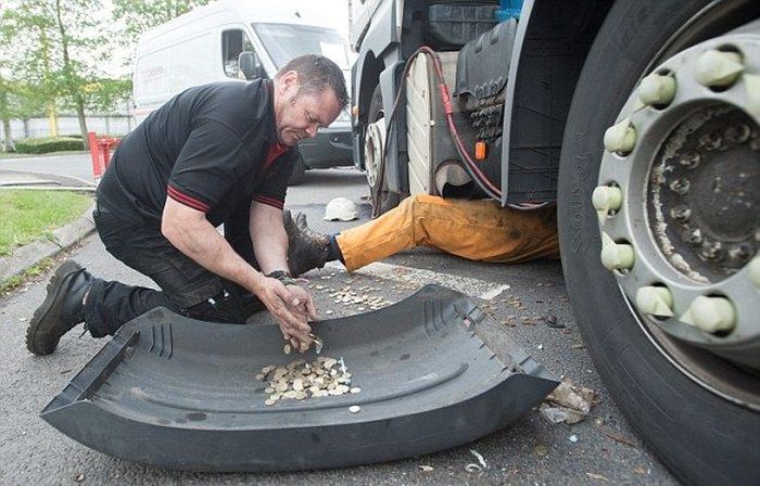Millions Of Coins Spill On To The Streets Of England (16 pics)