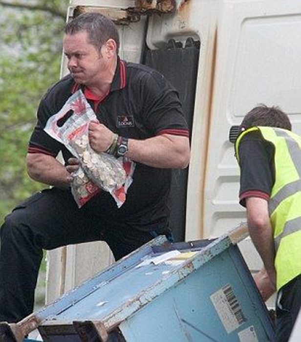 Millions Of Coins Spill On To The Streets Of England (16 pics)