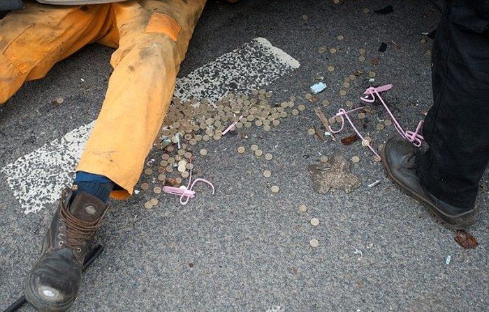 Millions Of Coins Spill On To The Streets Of England (16 pics)