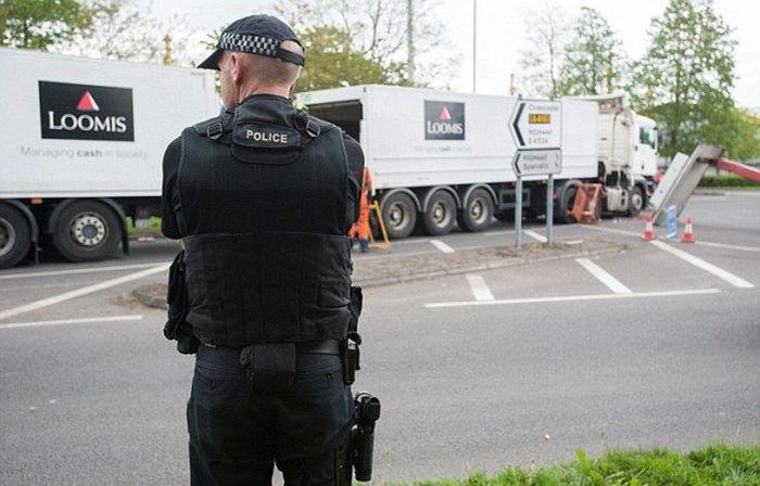 Millions Of Coins Spill On To The Streets Of England (16 pics)