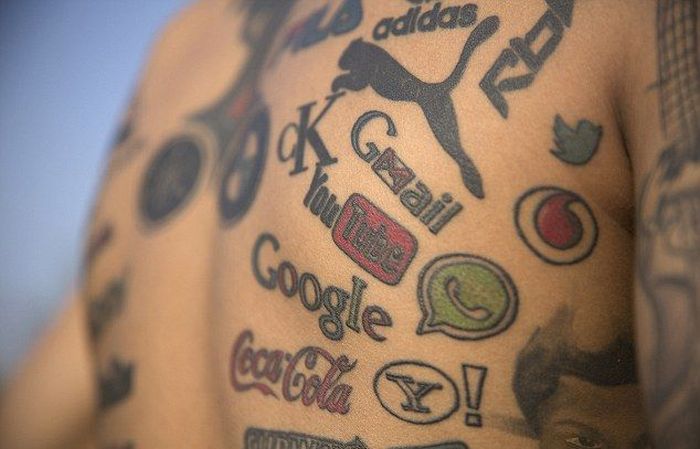 Meet The Man Who Covered His Body With Brand Logo Tattoos (5 pics)