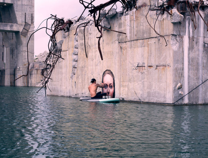 Hawaiian Artist Paints Incredible Seaside Murals While On A Surfboard (10 pics)