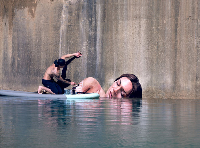 Hawaiian Artist Paints Incredible Seaside Murals While On A Surfboard (10 pics)