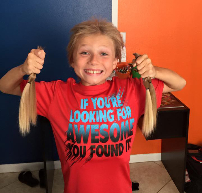 8 Year Old Boy Grows His Hair Long To Donate It For Cancer Patients (8 pics)