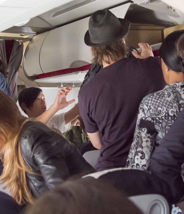 Angelina Jolie And Brad Pitt Pass On First Class As They Fly To Paris (14 pics)