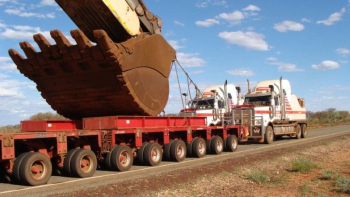 It Took Six Trucks To Move This Mining Excavator (4 pics)