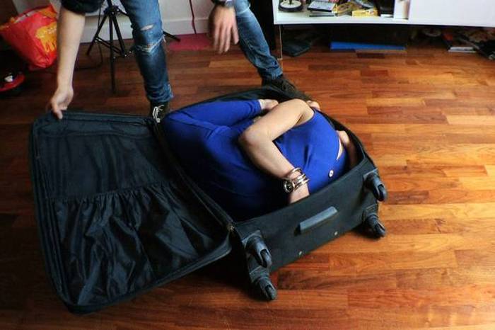 This Girl Is So Flexible That She Can Fit Herself Inside A Suitcase 19