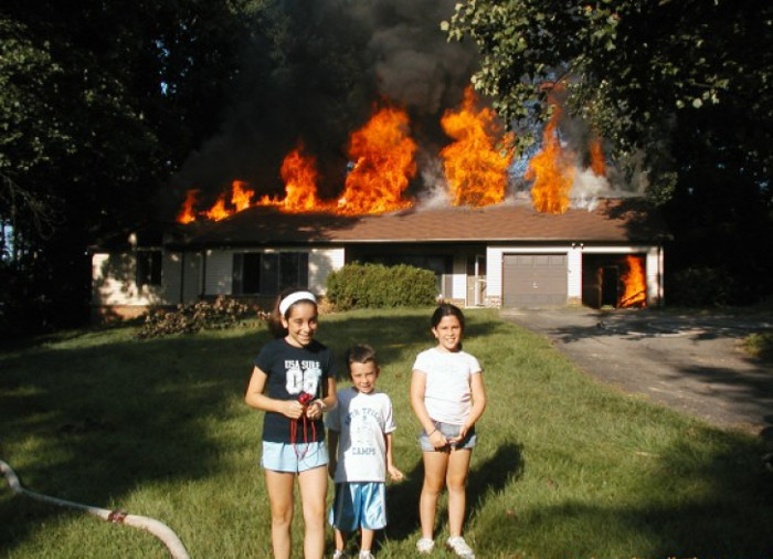 Happy Pictures That Were Taken As The Background Burned To The Ground (20 pics)