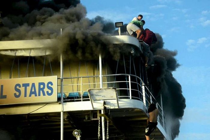 Terrified Passenger Jumps Out Of Burning Ferry  (3 pics + video)