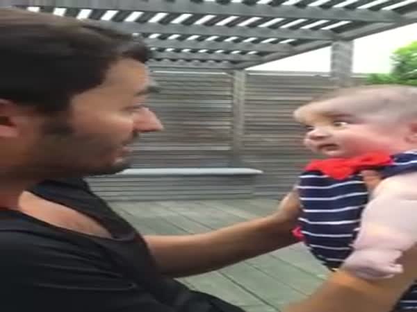 Man Talks To A Baby