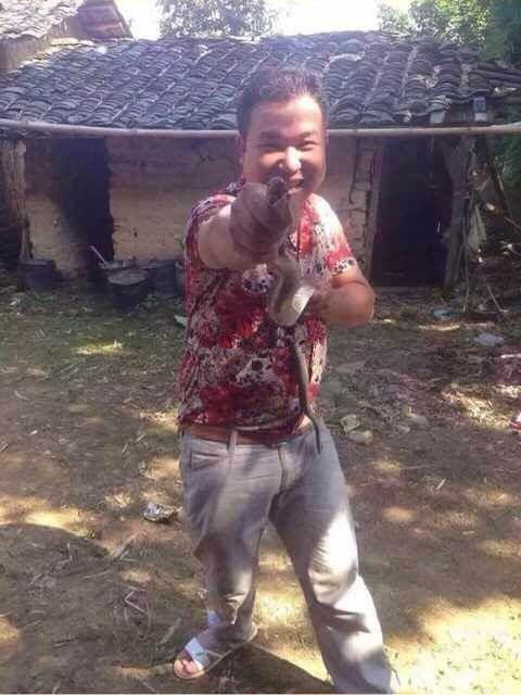 Chinese Man Trying To Get Friendly With A Poisonous Snake Goes Horribly Wrong (3 pics)