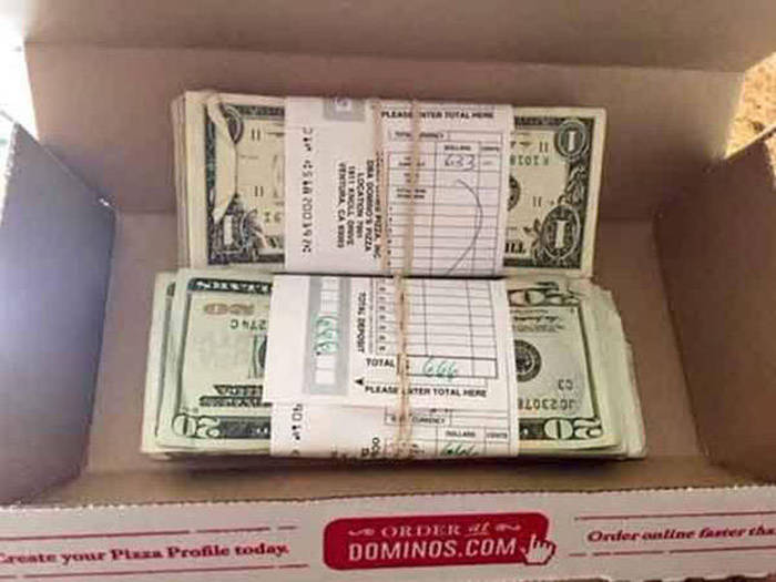 Domino’s Driver Accidentally Delivers A Stack Of Cash To A Customer's Door (5 pics)