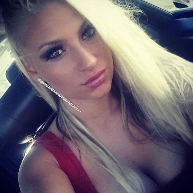 MMA Fighter's Breasts Get Her Bumped Up To A Heavier Weight Class (5 pics)