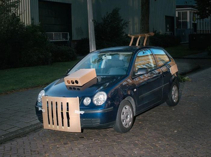 One Man Is Pimping Out People's Cars With Cardboard (8 pics)