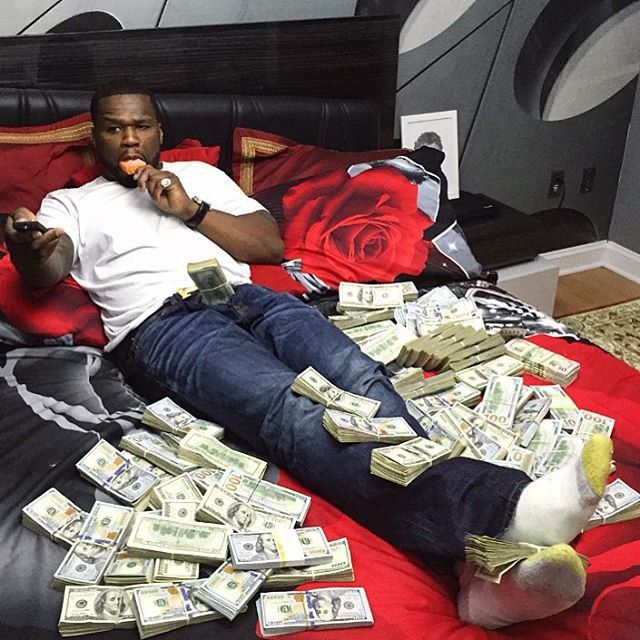 50 Cent Sure Doesn't Look Like He's Bankrupt (2 pics + video)