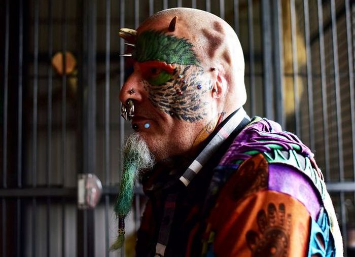 Animal Lover Chops Off His Ears So He Can Look Like A Parrot (8 pics)