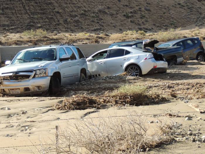 California Highway Workers Try To Uncover Vehicles Trapped In Landslide (16 pics)
