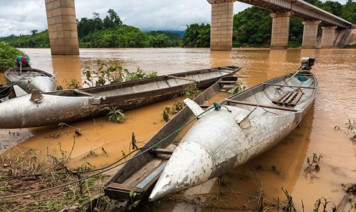 Citizens Of Laos Use Unexploded Bombs For Unexpected Purposes (12 pics)