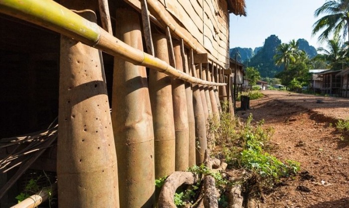 Citizens Of Laos Use Unexploded Bombs For Unexpected Purposes (12 pics)