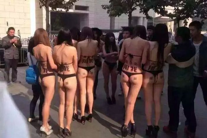 Near Naked Models Walk The Streets Of Beijing With QR Codes On Their Butts (4 pics)