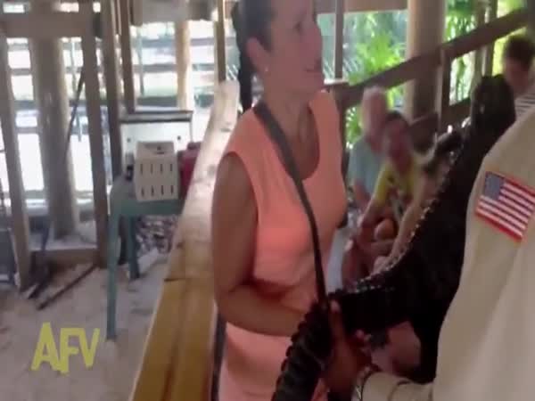 Woman Reacts To Holding Baby Alligator