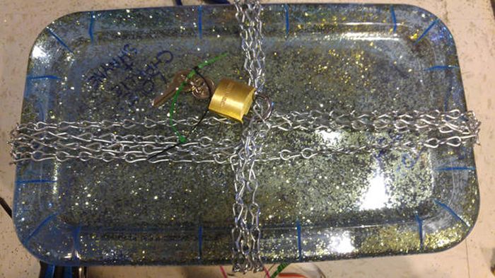 Guy Takes Holiday Gift Wrapping To The Extreme (14 pics)