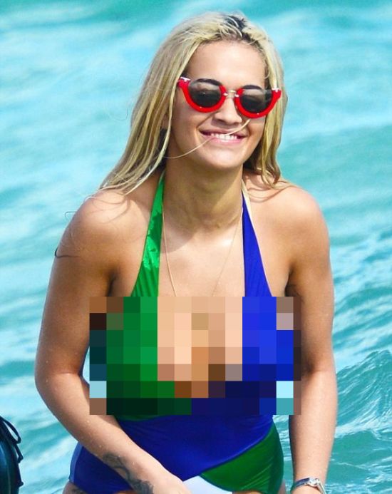 Rita Ora Shows Off Her Sexy Body In A Low Cut Swimsuit On The Miami Beach (10 pics)