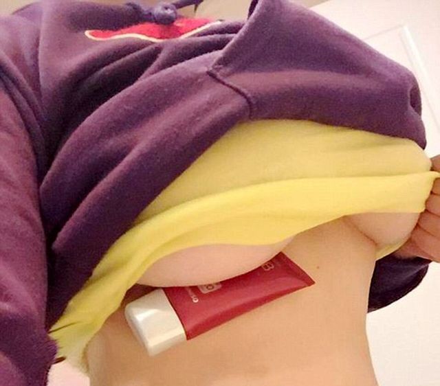 Women Trying To Hold Pens Under Their Breasts (15 pics)