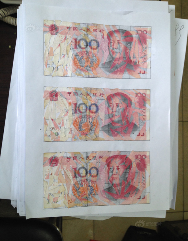 A Chinese Couple Spent Months Piecing Together $21,000 In Shredded Banknotes (3 pics)