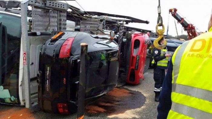 Transporter Carrying 9 Supercars Overturns On The Road (9 pics)