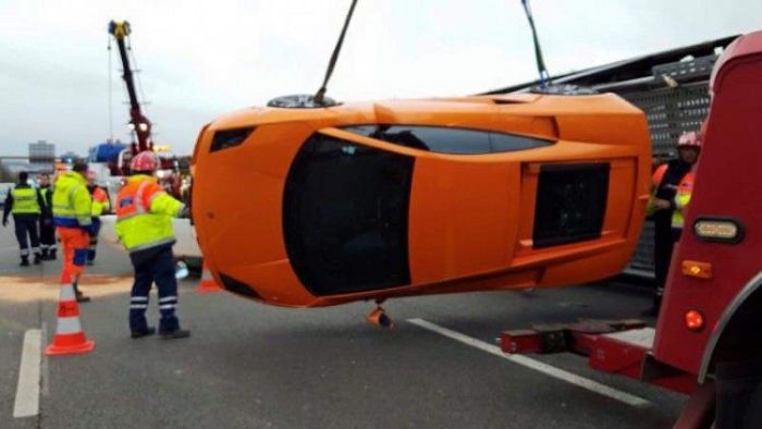 Transporter Carrying 9 Supercars Overturns On The Road (9 pics)