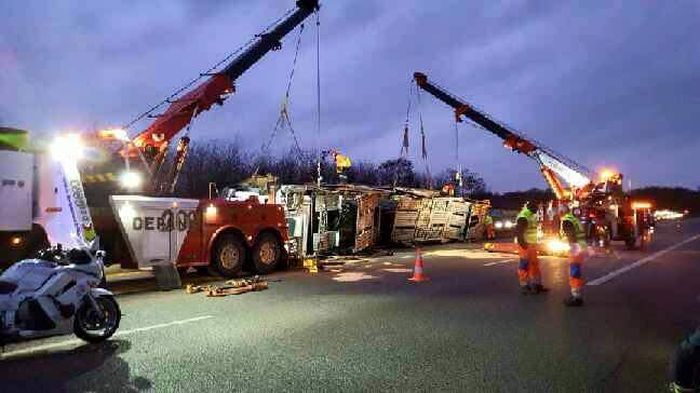 Transporter Carrying 9 Supercars Overturns On The Road (9 pics)