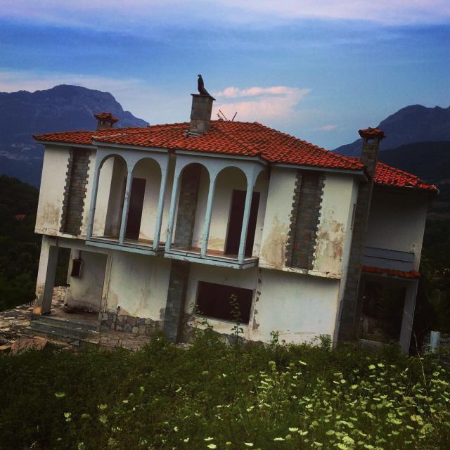 There's A Sinking Ghost Town In Greece (9 pics)