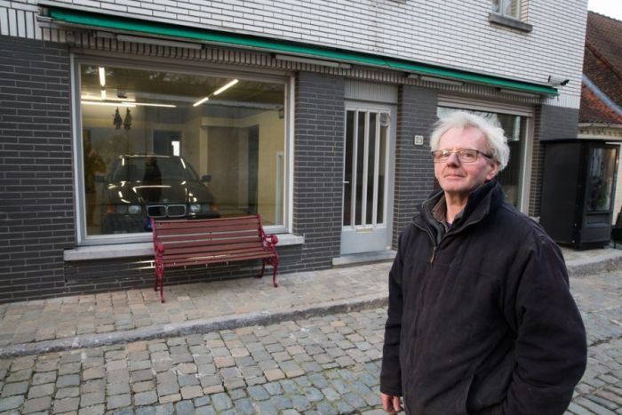 Belgian Man Builds A Secret Garage Door (13 pics)